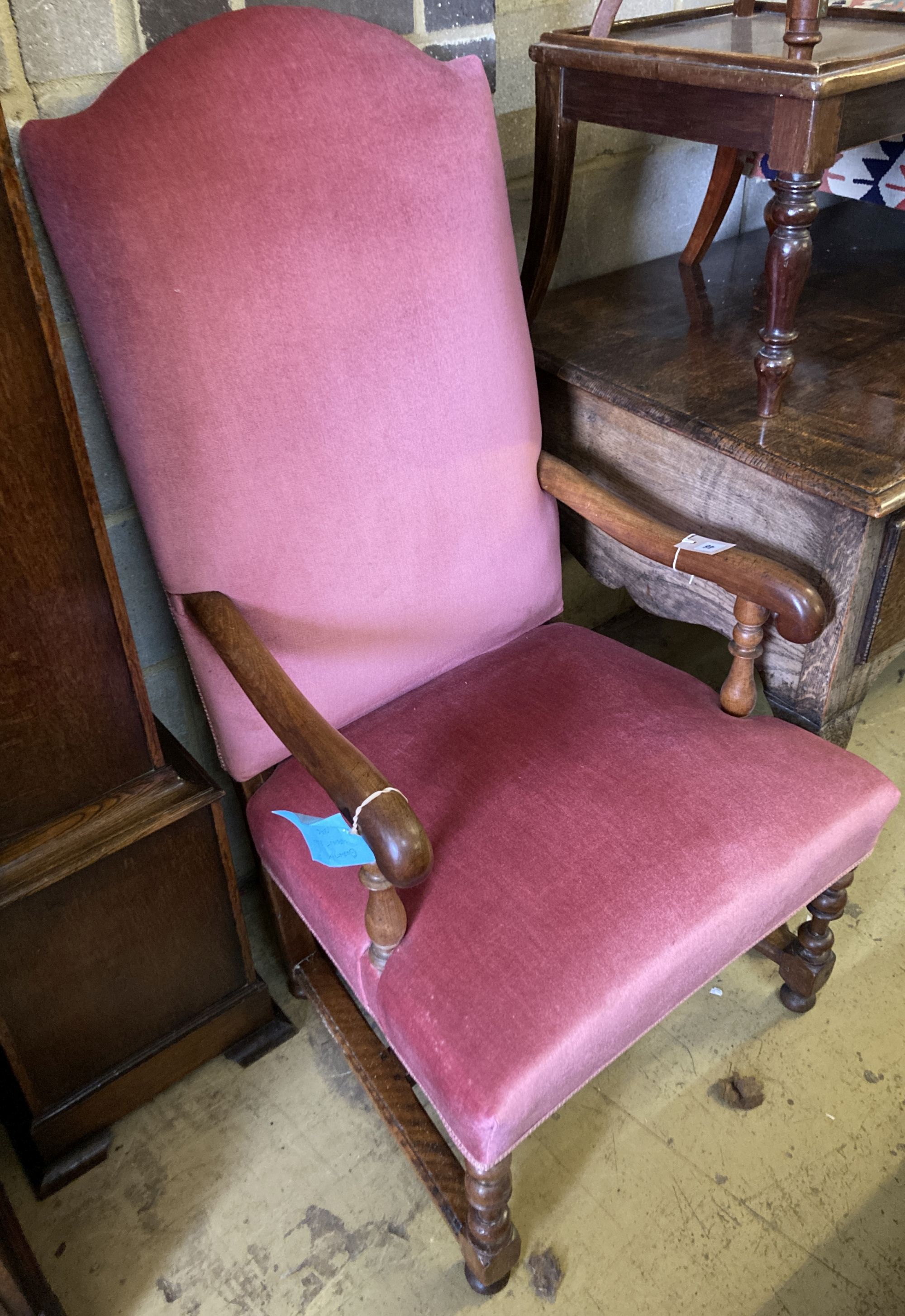 A walnut upholstered elbow chair, circa 1700